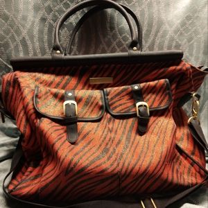 Cynthia Rowley weekender bag. Orange and black zebra print pet/smoke free.